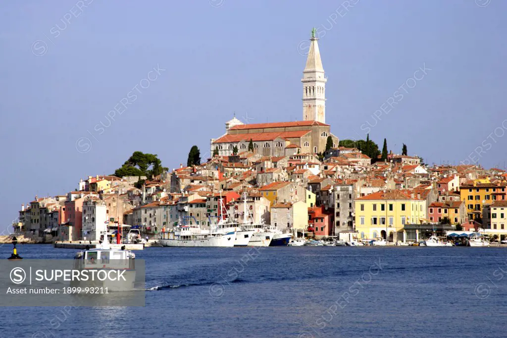 Croatia Istria Rovinj harbor view of old town and cathedral across harbor.