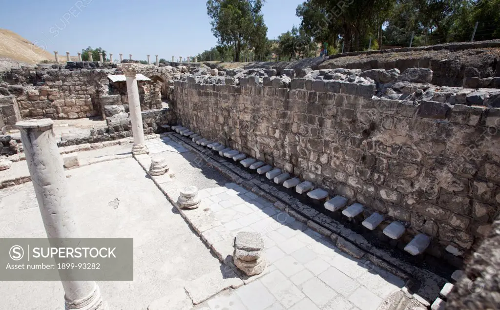 Communal latrines at the Beit Shean Archaeological Site, Israel. (Photo by: Independent Picture Service/UIG via Getty Images)