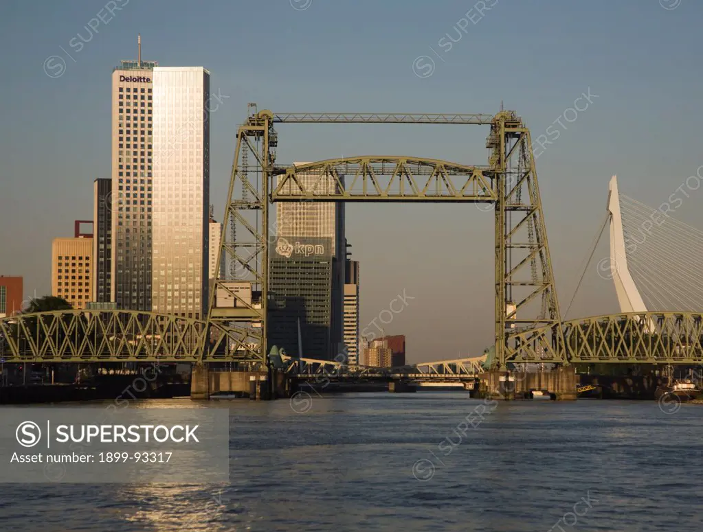 Early morning sunshine on the River Maas and de Hef railway bridge, Koningshaven, Rotterdam, Netherlands. (Photo by: Geography Photos/UIG via Getty Images)