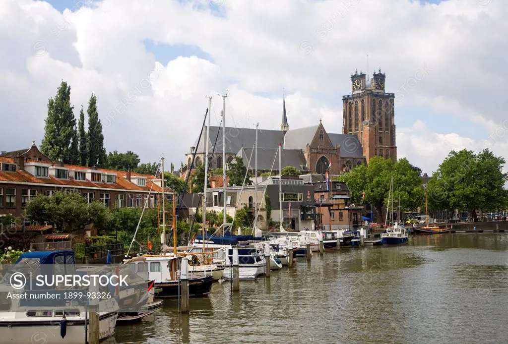 Grote Kerk cathedral church and boats in Nieuwe Haven, Dordrecht, Netherlands. (Photo by: Geography Photos/UIG via Getty Images)