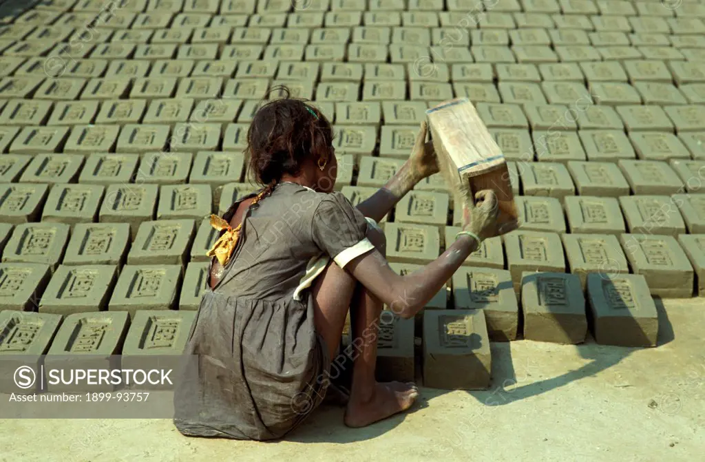 Child worker making bricks, India,11/23/1998