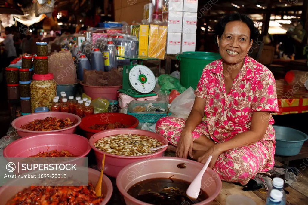 Thanh Young makes and sells pickles at the Kampot market with a $3,000 loan from TPC microfinance, Cambodia,02/14/2011