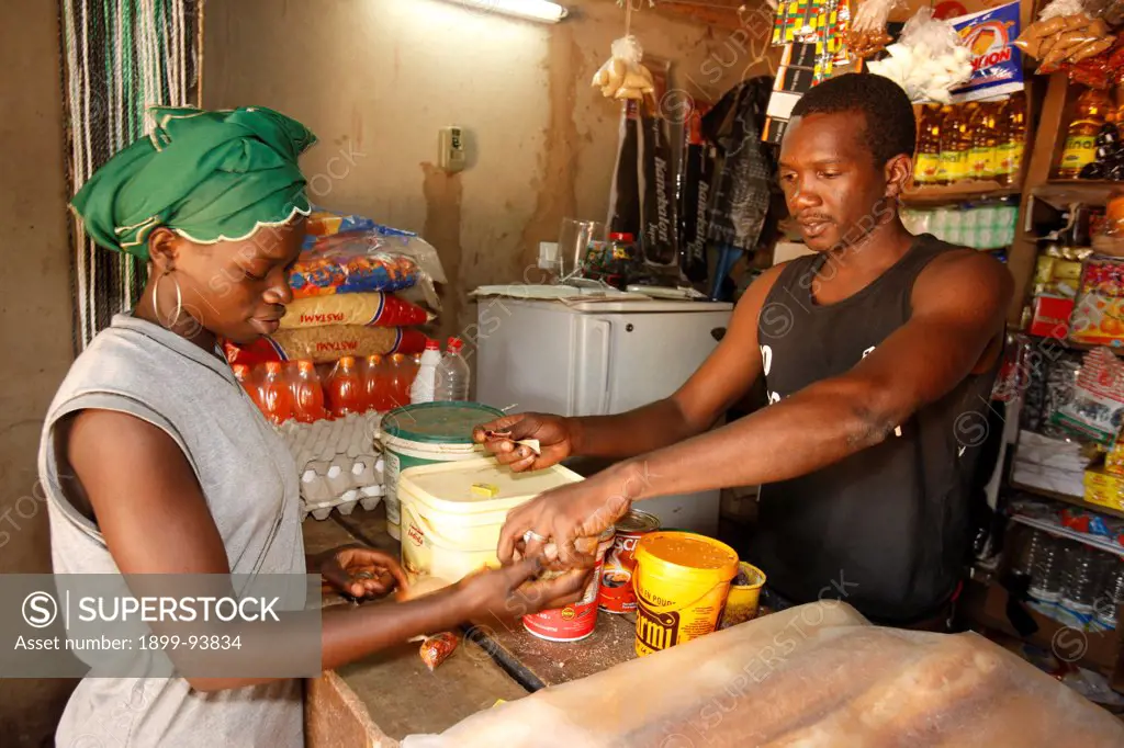 26-year old mine victim Samba Sy opened a shop with a CFA 400,000 loan from Asacase, Senegal,12/15/2008