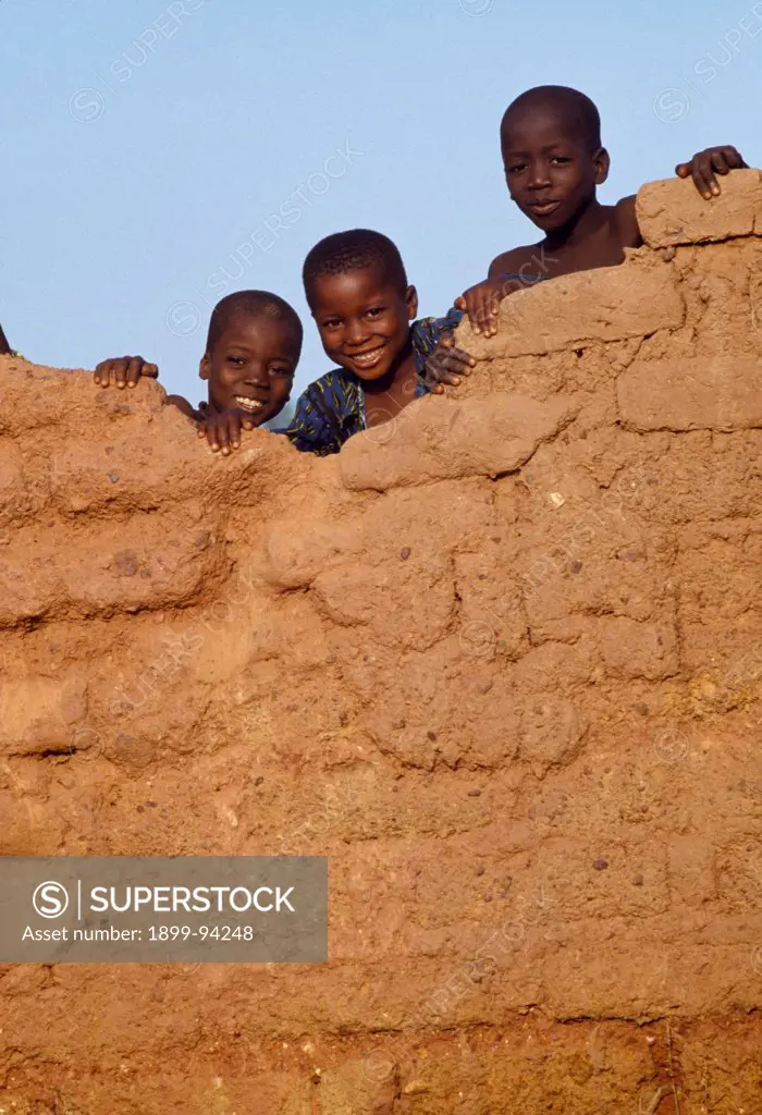 African children playing on a wall, Bamako, Mali.,07/12/1998