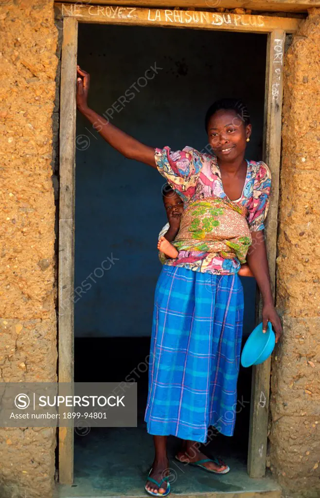 Woman on her doorstep, Kpalime, Togo.,11/11/2001
