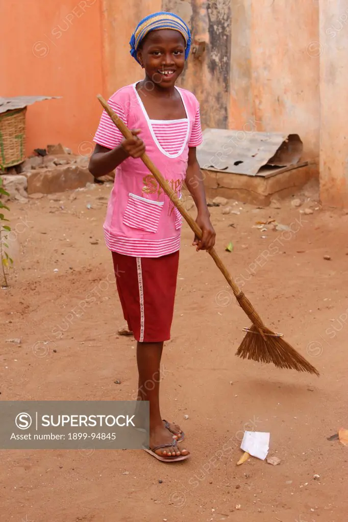 Househlod chores, Lome, Togo.,02/08/2009