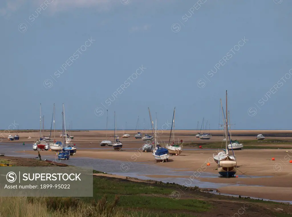 Yachts at low tide, Wells-Next-The-Sea, Norfolk. UK.  29/03/2012