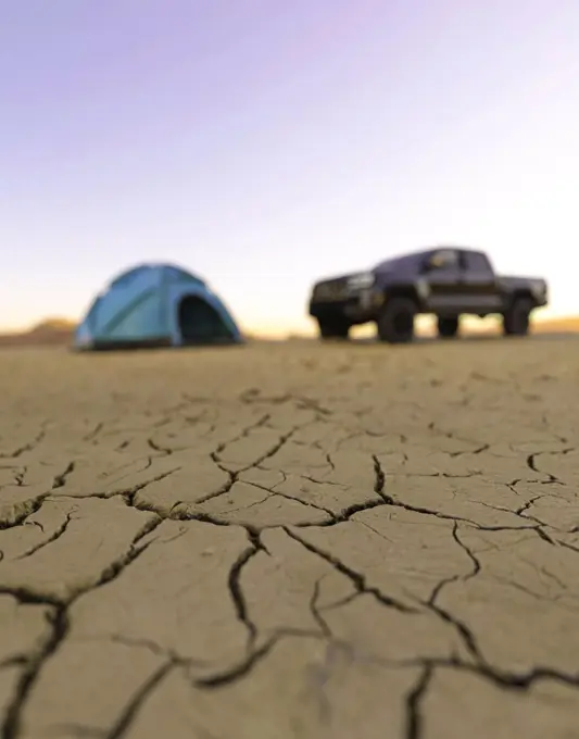 Desert camping on a cracked dry floor in a remote location 3d render
