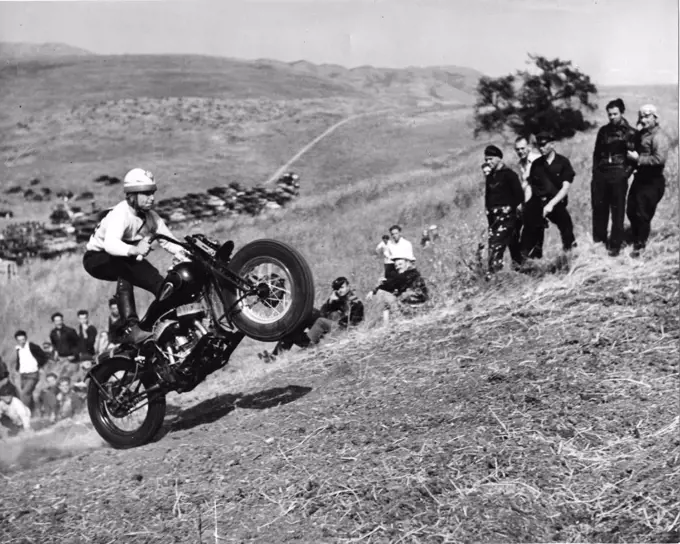 Santa Clara County, California, April 5, 1940 - Motorcycle Hill Climb - At the start of the course. The going gets even rougher and steeer further on. The crowd in the background is composed almost entirely of young fellows. At the botto,m of the hill can be seen the parking area. Besides the automobiles, approximately 200 motorcyclists had come to this Sunday event.