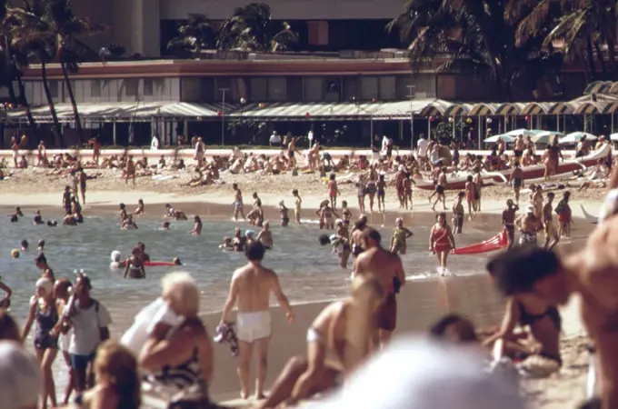 Waikiki Beach is the most popular tourist spot on the island there are 26,000 hotel rooms on Oahu. Most of them are in the Waikiki area, October 1973. 