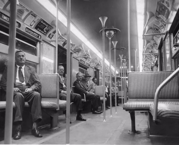 Businessmen travel to and from work in one of the New York Subway System's new stainless steel cars made by the Budd Manufacturing Co in Philadelphia, New York, NY, 1949. (Photo by INP/United States Information Agency/GG Vintage Images)