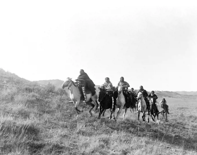 Edward S. Curtis Native American Indians - Cheyene Indians riding horses ca. 1910. 