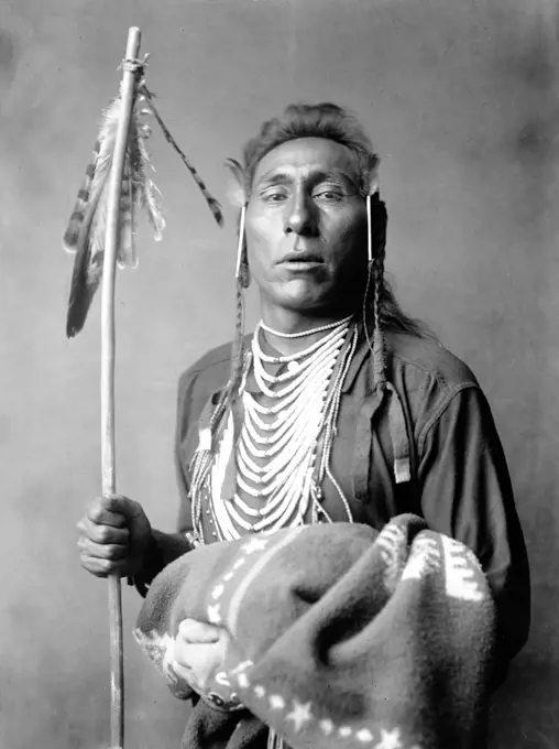 Edward S. Curtis Native American Indians - Crow Indian Tries His Knee ca. 1908. 