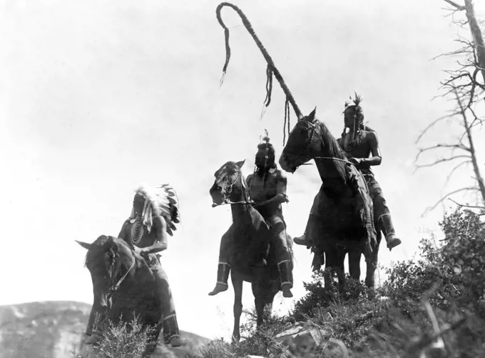 Edward S. Curtis Native American Indians -  Three Crow Indians, Uphaw, Which Way, and Packs The Hat, on horseback ca. 1905. 