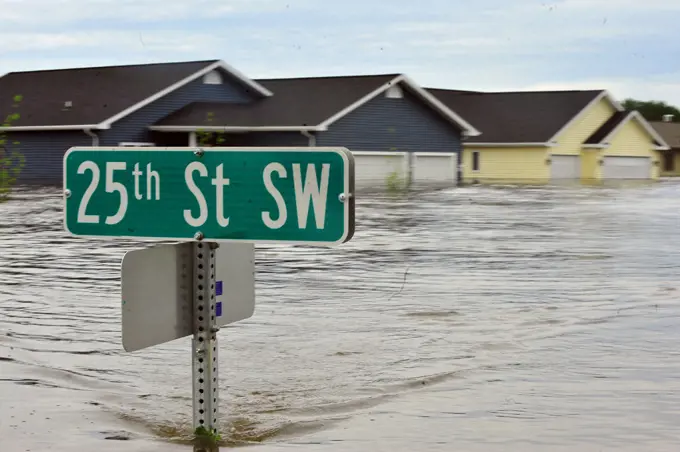 Ten feet of water flood nearly 20 percent of the neighborhood throughout the city of Minot, N.D., leaving more than 4,000 homes inundated by flooding, June 25. 
