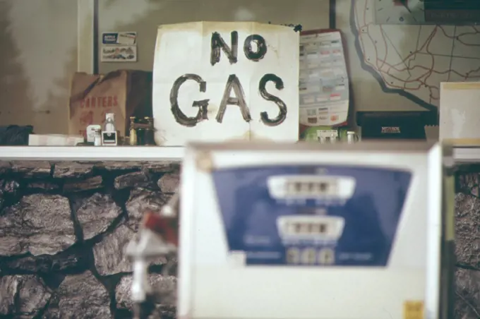 No gas sign on window of gas station and empty gas pump in Portland, Oregon in early 1970s. 