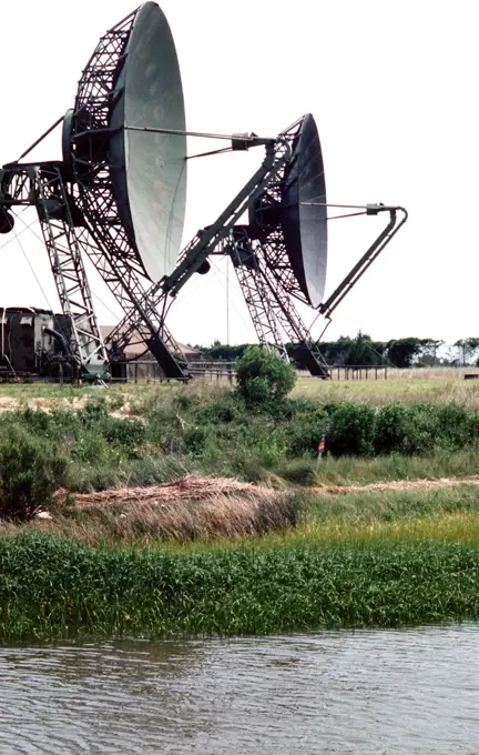 1977 - Two large dish-shaped radar antennas in use during joint readiness training exercise SOLID SHIELD '77. 