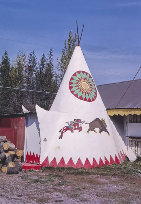 1980s United States -  Teepee BBQ at The Huckleberry Patch, Route 2, Hungry Horse, Montana 1987. 