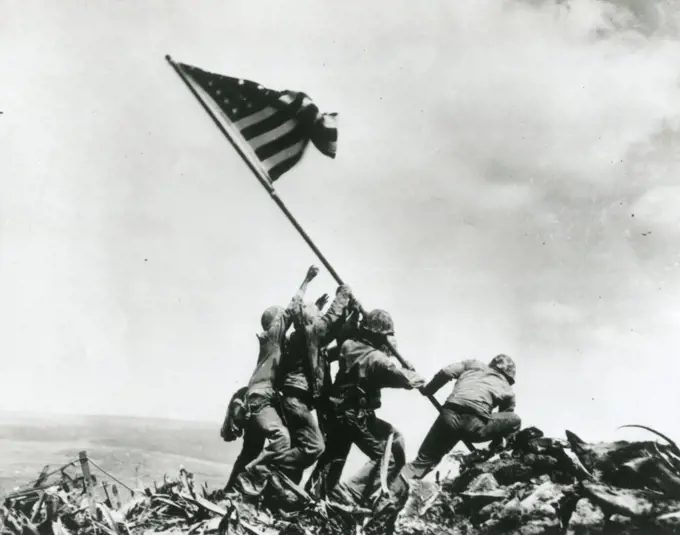 Feb 23, 1945, Flag-raising on Iwo Jima. Joe Rosenthal, Associated Press, (Navy)