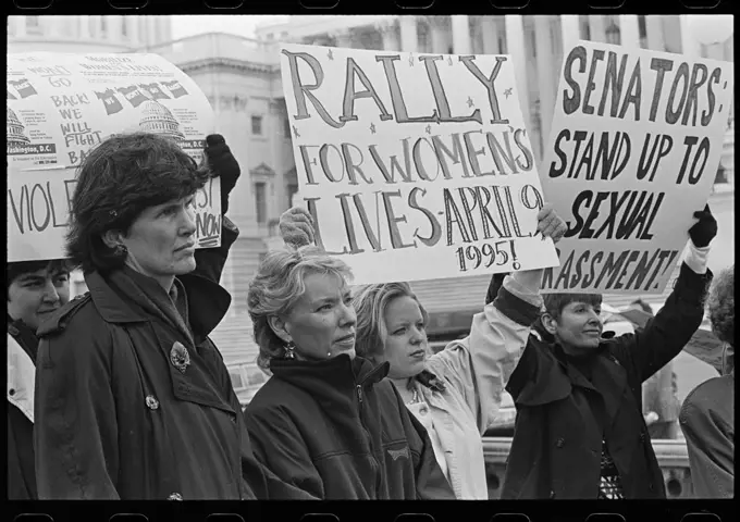 Women outside the U.S. Capitol holding signs supporting the National Organization for Women's 'Rally for Women's Lives' and against sexual harassment, probably in reference to the accusations against Senator Bob Packwood Contributor Names  Keating, Maureen, photographer  Created / Published  1 April 1995