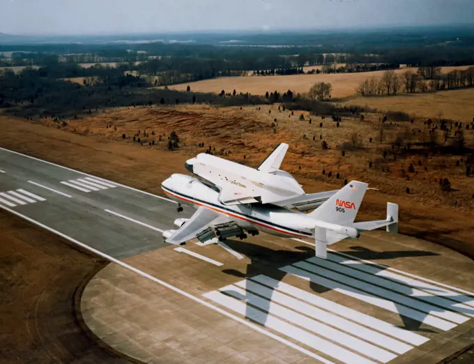 (13 March 1978) --- The space shuttle orbiter 101 Enterprise approaches riding atop its 747 carrier aircraft, arrives at the Redstone Arsenal airstrip near Marshall Space Flight Center (MSFC), Huntsville, Alabama, on March 13, 1978.