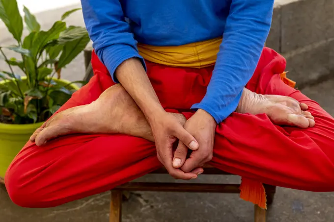 Man sitting in a buddhist center in western France