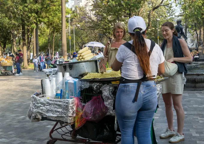Stall selling fast food sweet corn snacks, Alameda Central Park, Mexico City, Mexico.
