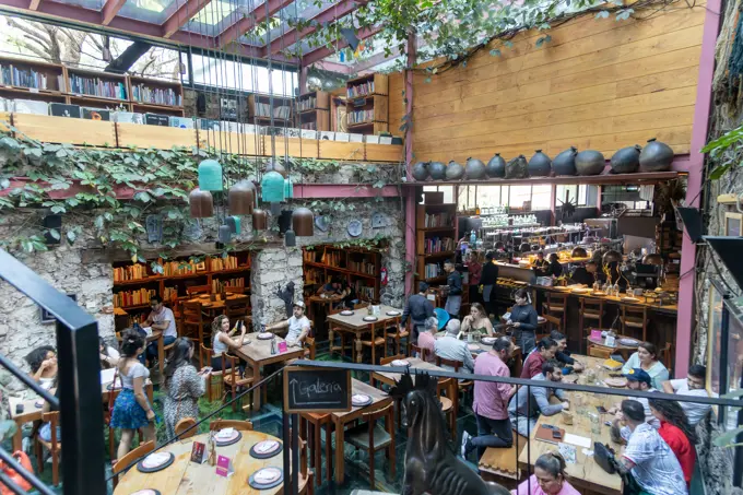 People at lunchtime inside Tetetlan Galeria restaurant, Jardines del Pedregal, Alvaro Obregon, Mexico City, Mexico.