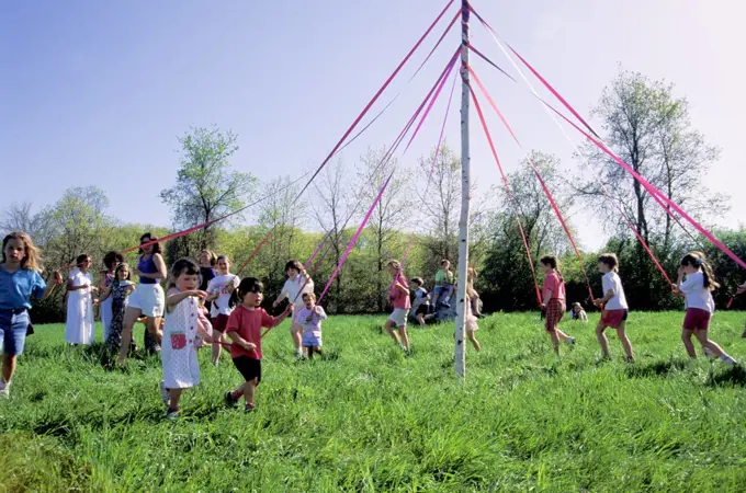May Day. Children Dancing Around Maypole.
