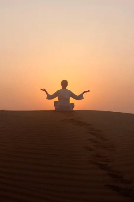Sunset meditation in the desert