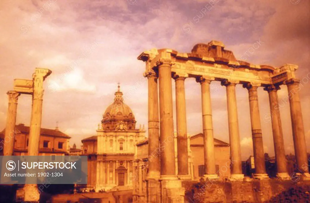 Italy Rome The Roman Forum Temple of Saturn and church of Santi Luca e Martina in warm grainy tones
