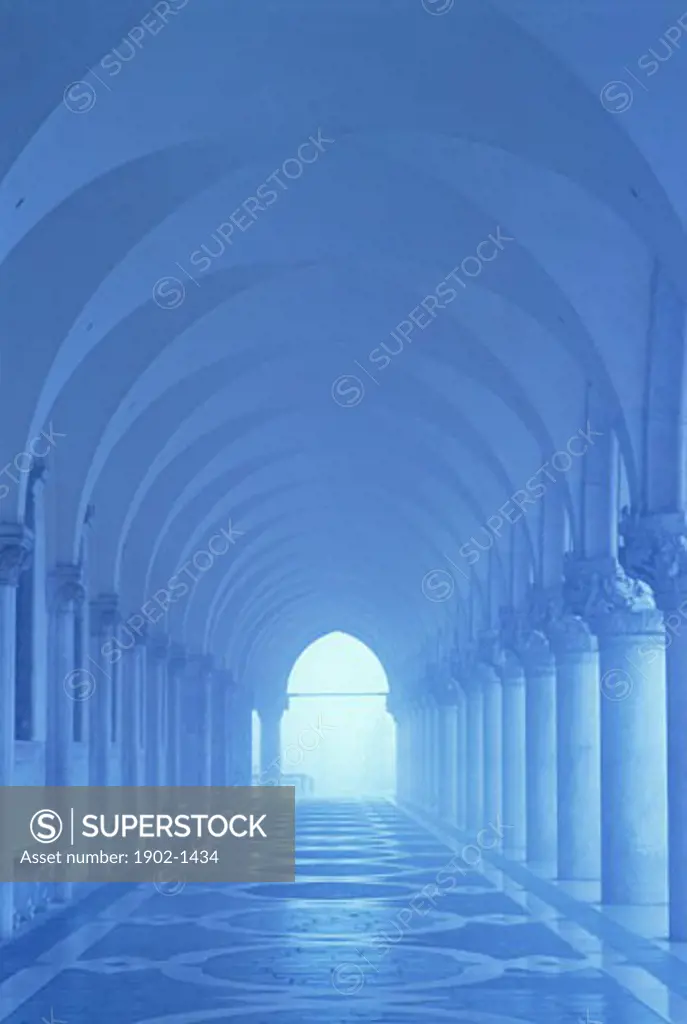Italy Venice Doges Palace columns and arches in blue tones