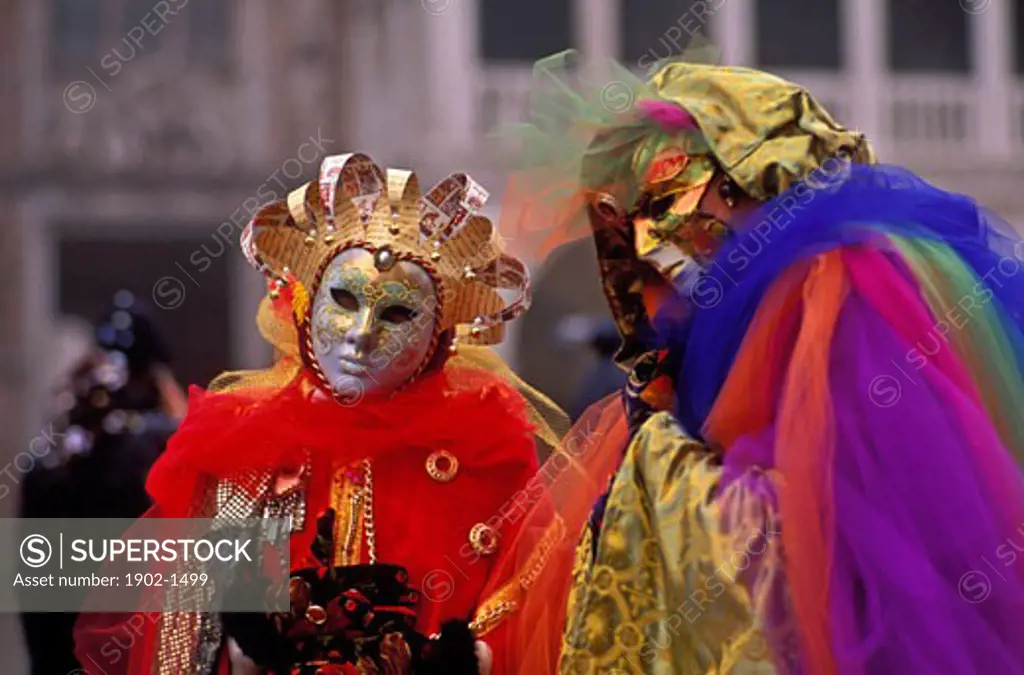 Italy Venice Piazza San MarcoCarnevale Carnival revellers dressed in costume