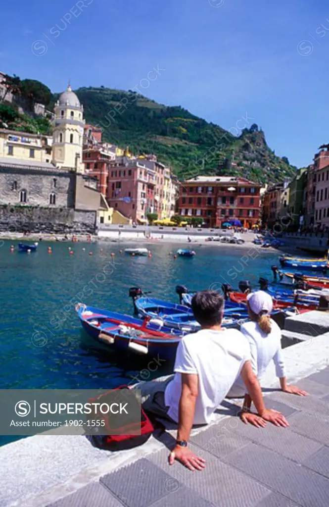 Italy Cinque Terre Liguria Vernazza couple enjoying harbor view