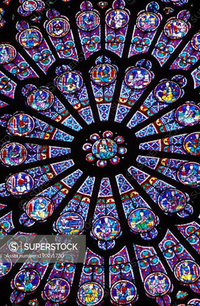 France Paris Notre Dame North Rose Window 13th century stained glass window depicting the Virgin Mary encircled by figures