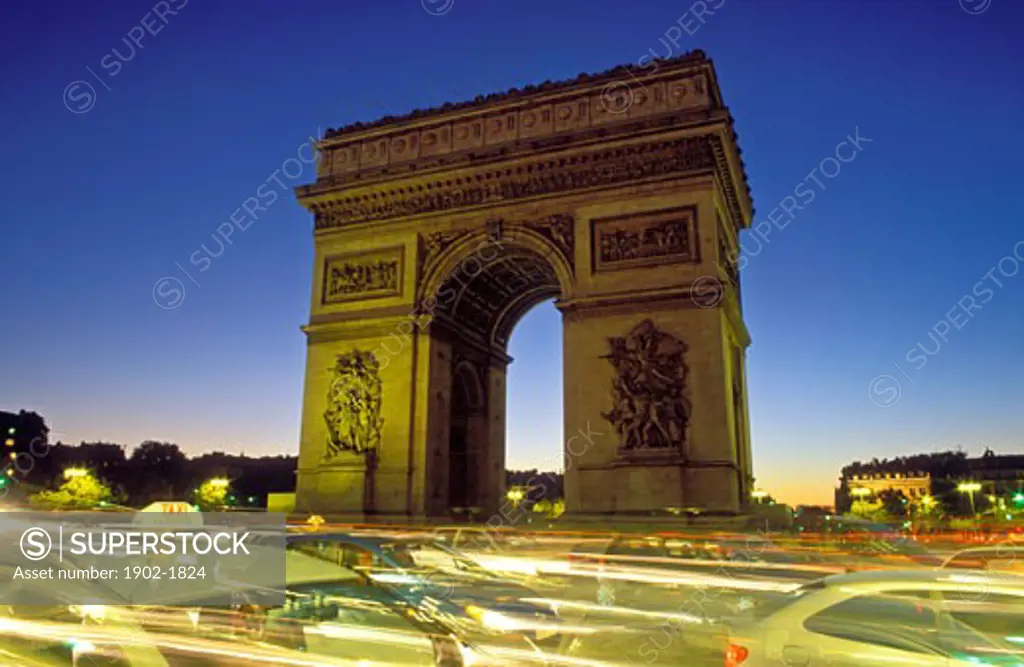 France Paris Arc de Triomphe and traffic at night