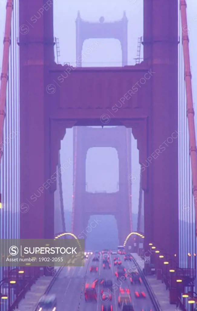 USA California San Francisco Golden Gate Bridge illuminated at dusk with traffic streaks