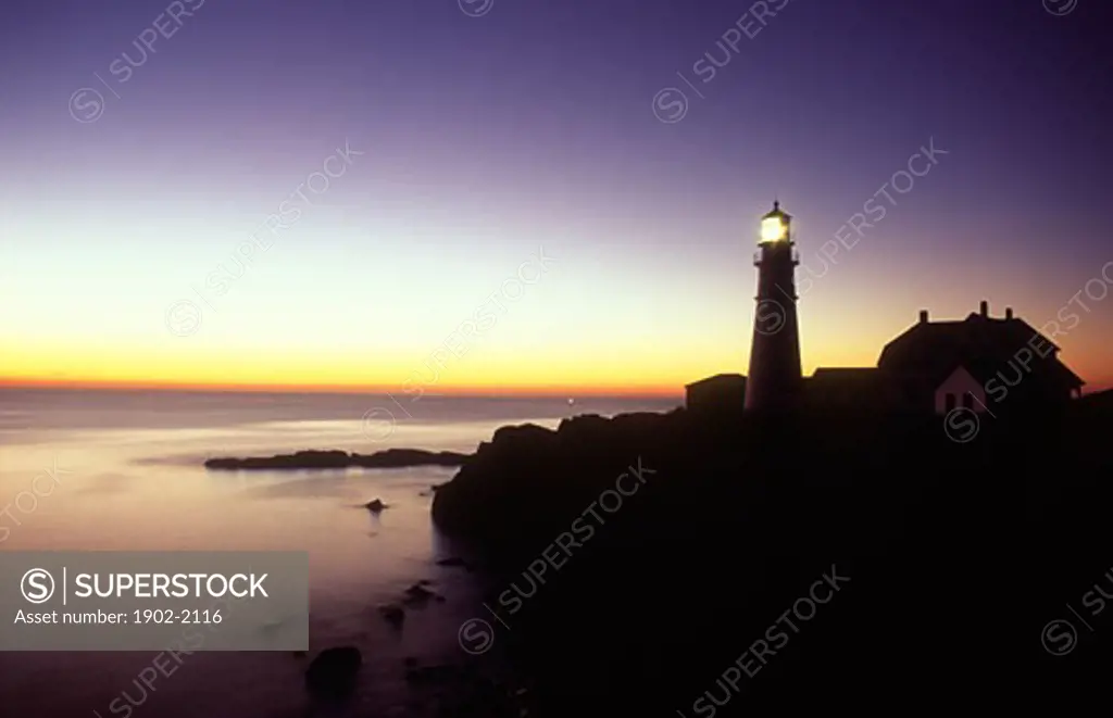 USA Maine Cape Elizabeth Portland Head Lighthouse view of lighthouse and lighthouse keepers house at dawn