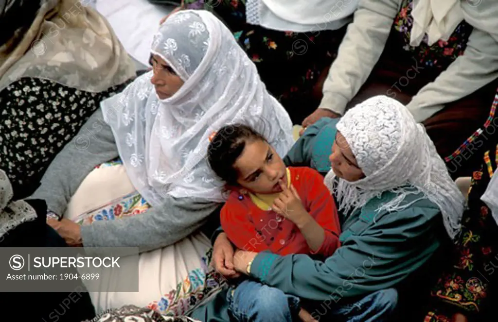 Palestinian Women and a girl at the pilgrimage to Nabi Musa