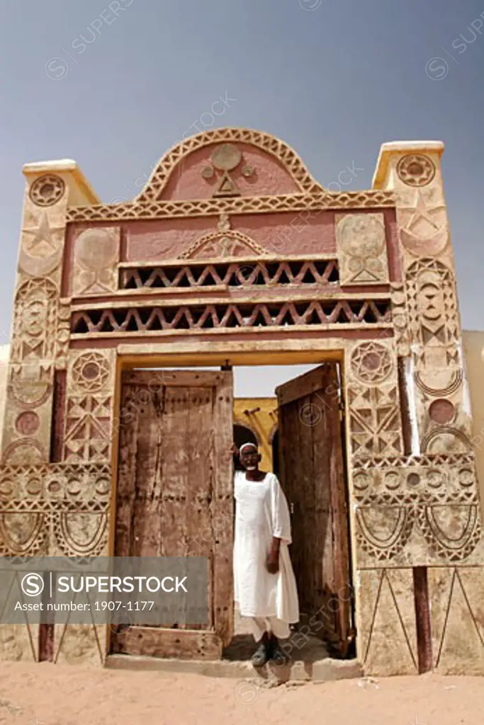 The entrace of the Karima Jebel Barkal hotel is a classical sculpted nubian door