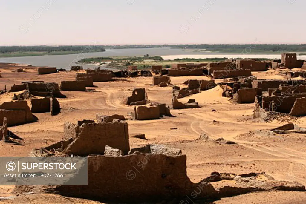 The ruins of the Old Dongola  antique capitale of Nubia In the backyard  the Nile river and the palm trees valley