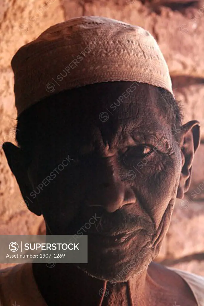 An old Nubian  guard of the Old Dongola fortress  along the Nile river