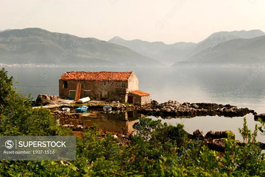 Some classical tile roof and stone walls houses on the gulf of Kotor