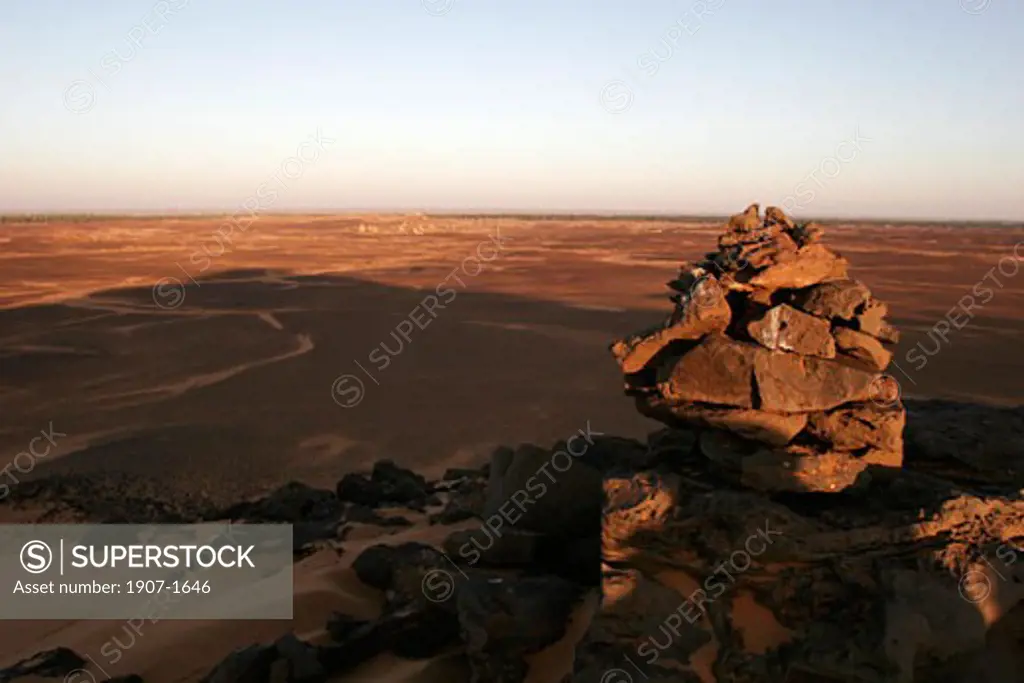 From the dunes of the Dongola desert  view in the far distant on the Old Dongola oblong pyramids