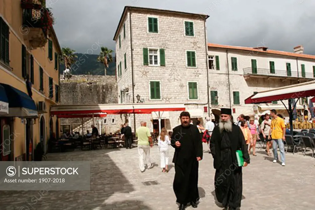 Two popes on the market square of the city of Kotor