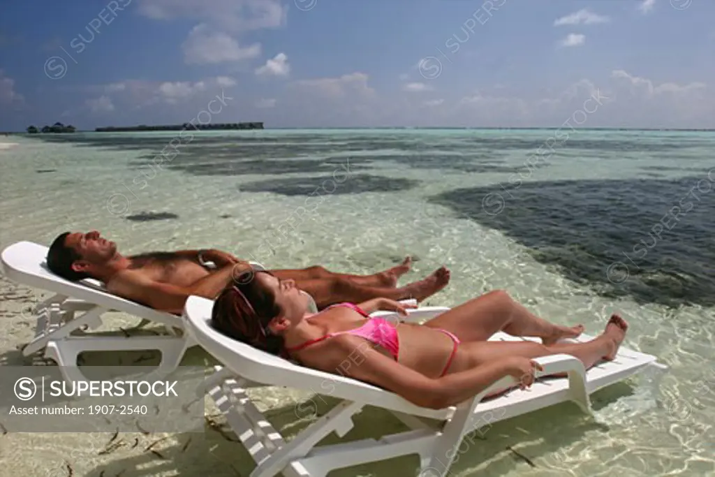 Relaxing in front of the bungalow White Sands hotel island Maldives