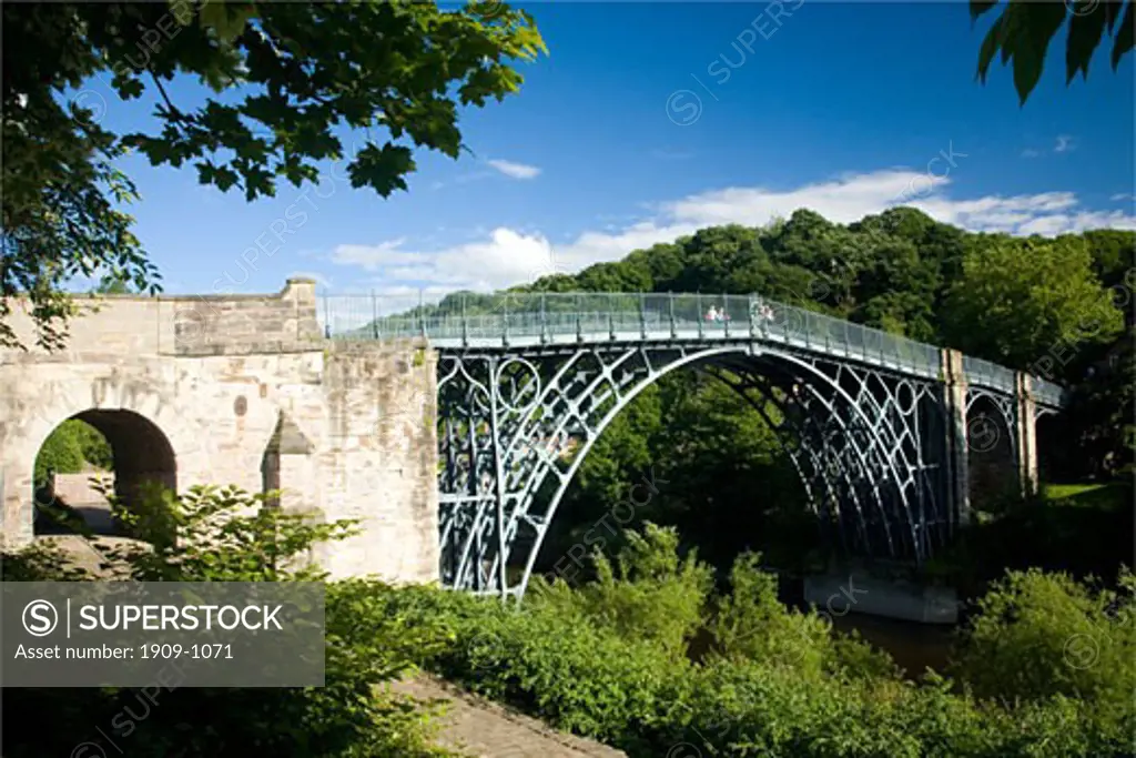 The worlds first iron bridge spans the banks of the River Severn in late evening summer light Ironbridge Shropshire England United Kingdom GB Great Britain British Isles Europe EU