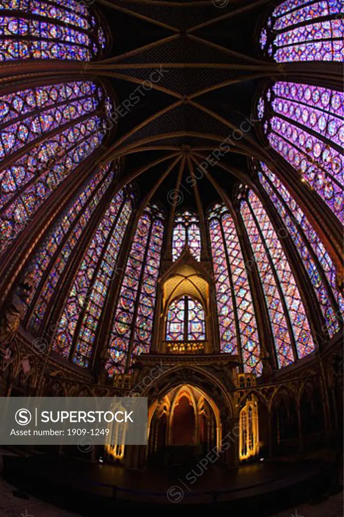 Interior of Sainte-Chapelle showing medieval stained glass window panels Paris France Europe EU