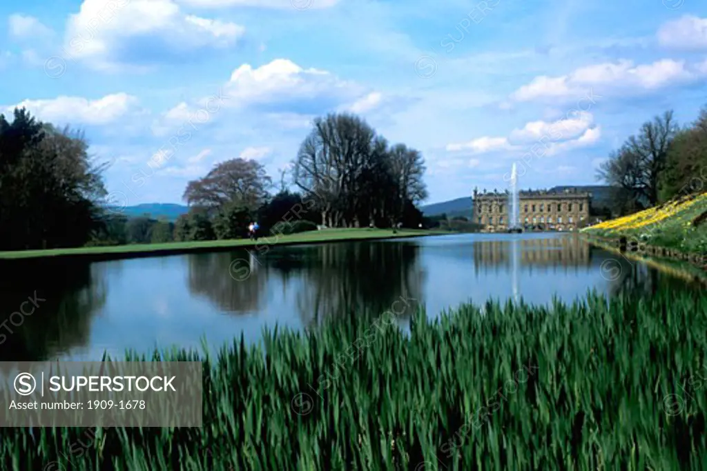 Chatsworth House and Emperor Fountain in spring Chatsworth Derbyshire England UK United Kingdom GB Great Britain stately home Peak District National Park Duchess and Duke of Devonshire stately home