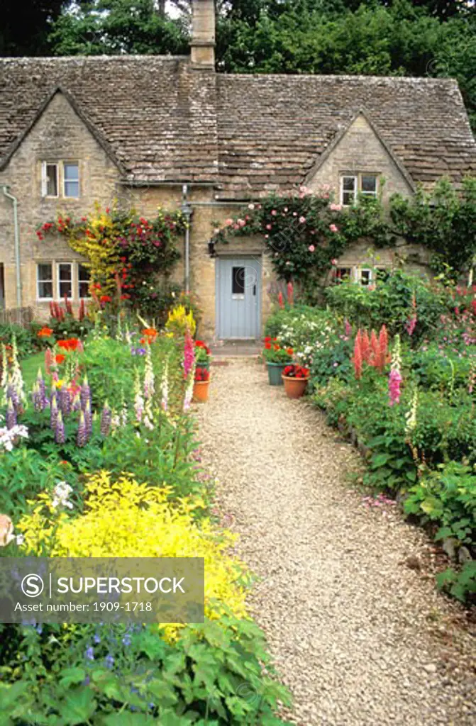 Bibury Cotswolds english cottage garden in summer Gloucestershire Glos England UK United Kingdom GB Great Britain British Isles Europe